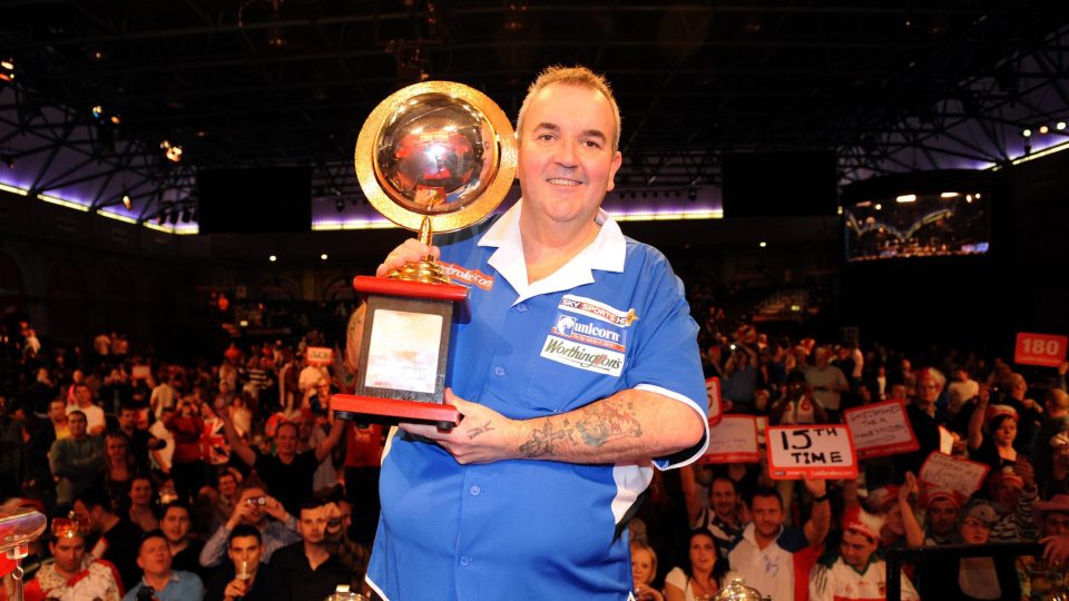 Phil Taylor bowed out with 16 world crowns, including this success in 2010