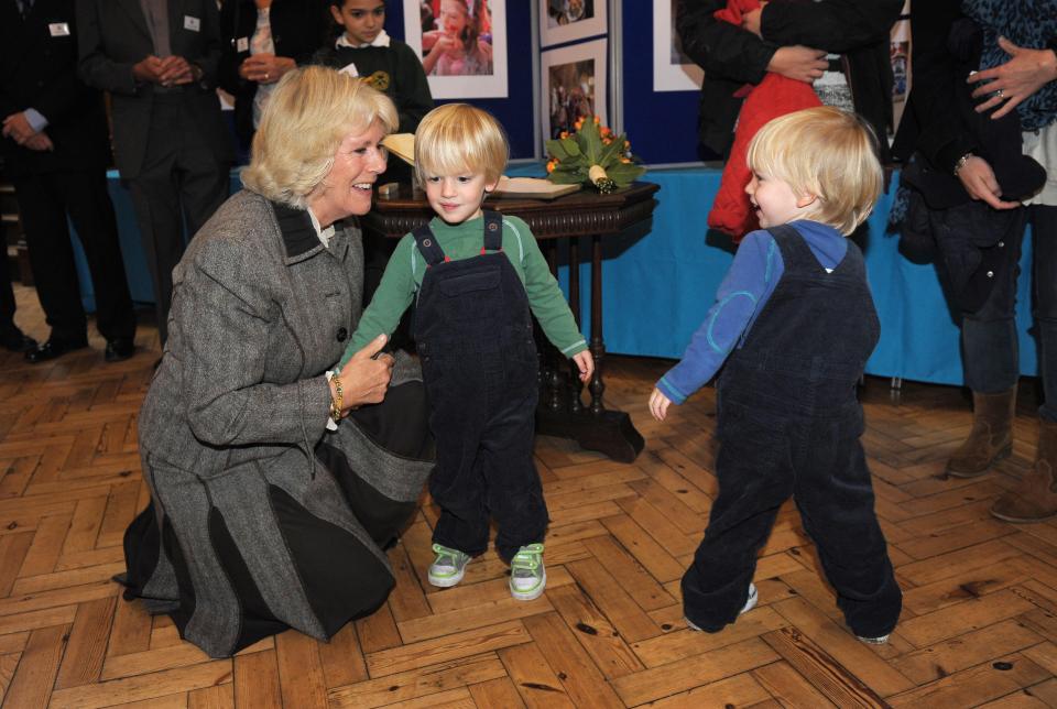 The Duchess has five grandchildren from her first marriage, pictured here with twins Gus and Louis