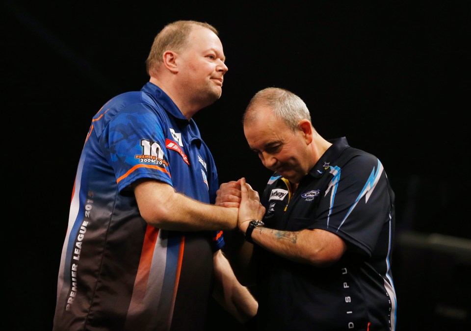  Raymond van Barneveld (left) will meet Phil Taylor in a charity match for the NHS