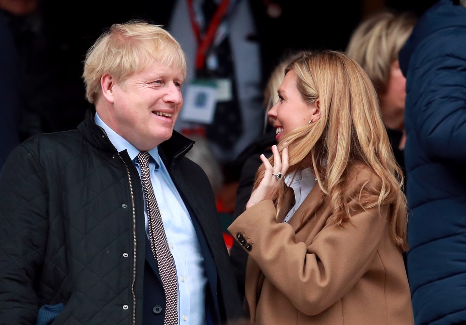  Boris and Carrie pictured in the stands during a Guinness Six Nations match at Twickenham Stadium, London