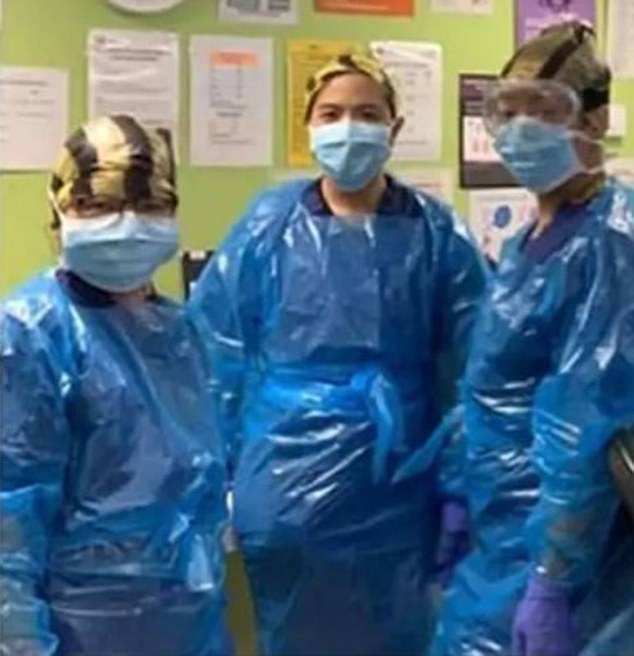  The nurses were snapped wearing the makeshift hazmat suits last month