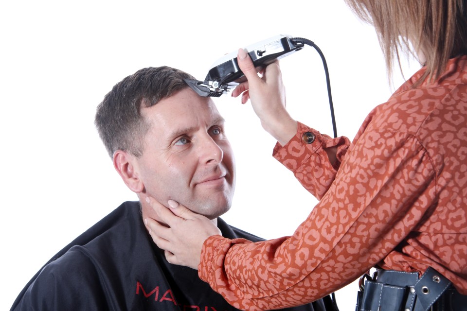 For the top of the head, change the clipper to grade five for a shorter cut and work in the opposite direction to the hair