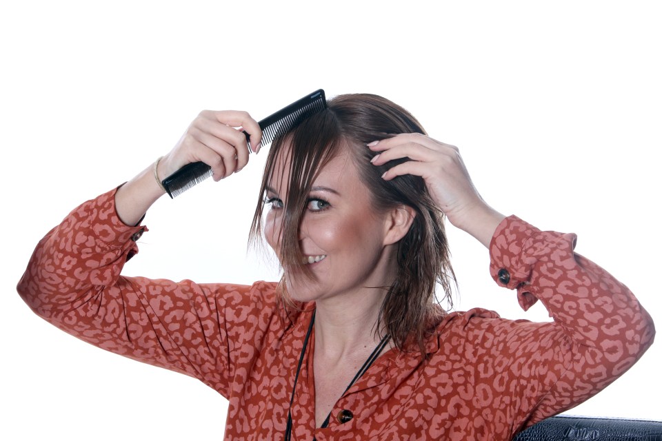 Take an inch-wide section of fringe and comb it before letting your fingers slide towards the end of the hair