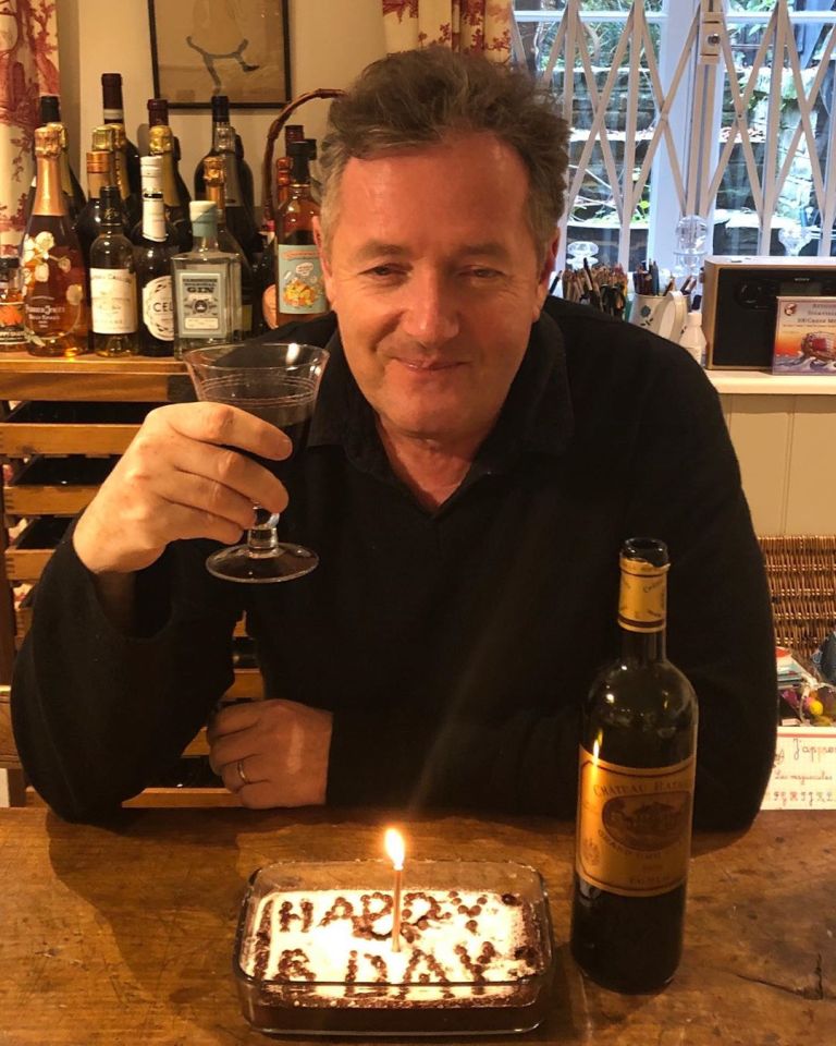  The TV presenter enjoying a glass of wine in his kitchen