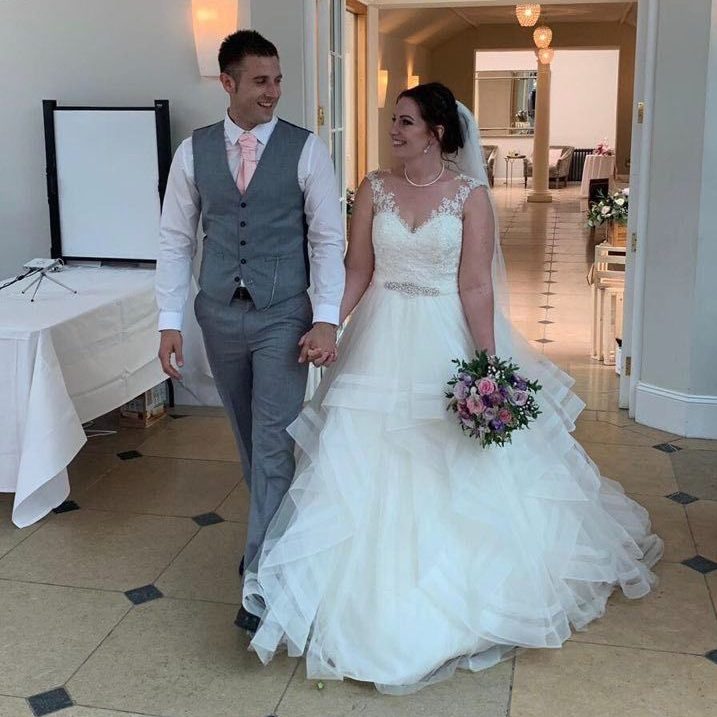 The 29-year-old is pictured on her wedding day with groom George, an engineer