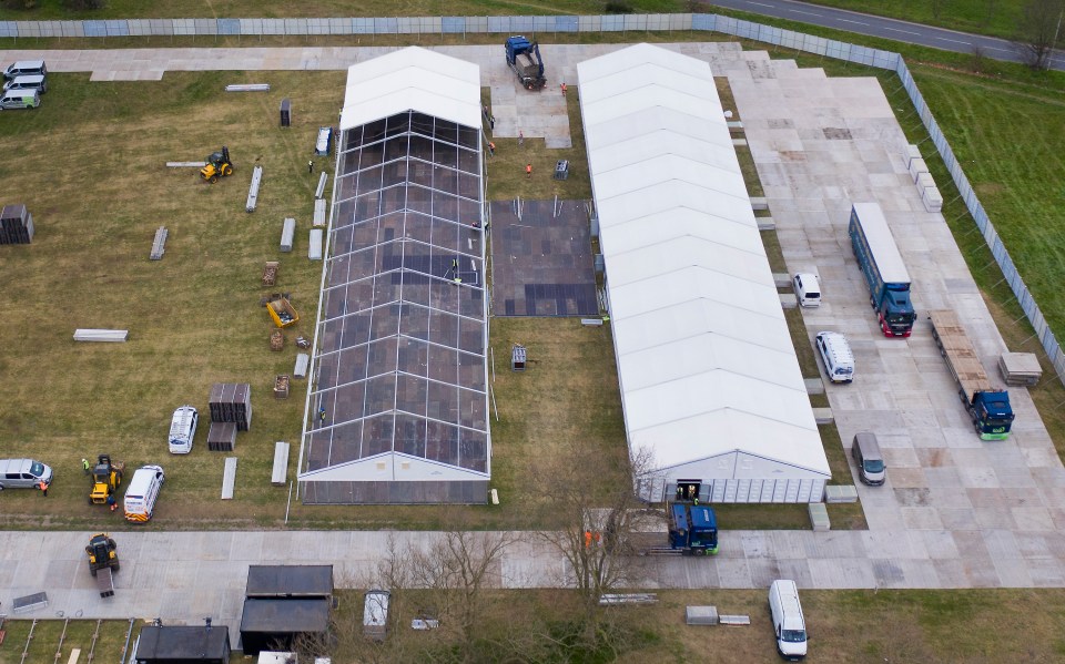  Work to build a temporary mortuary near Manor Park in east London continues