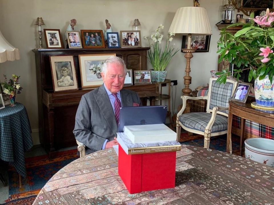  Clarence House shared this photograph showing Prince Charles propping up his iPad to make the address