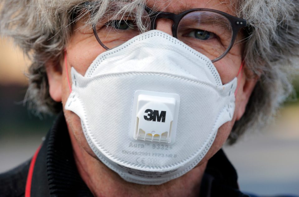  A man wearing a FFP3 type protective mask