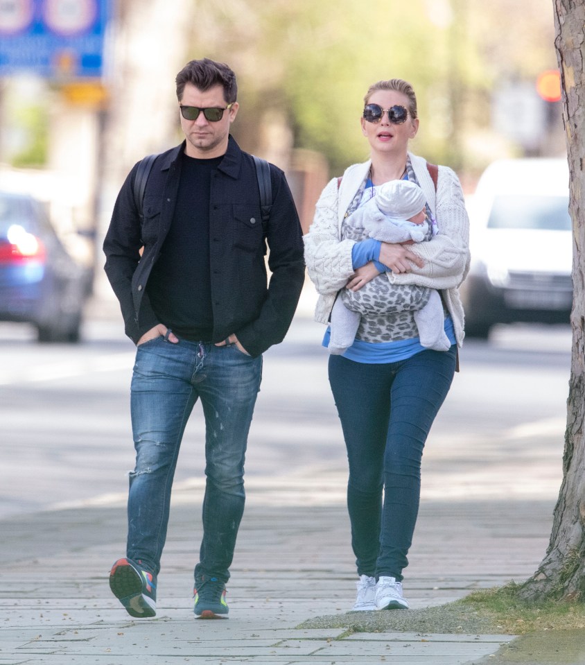  Rachel Riley and Pacha Kovalev take their daughter Maven for a walk