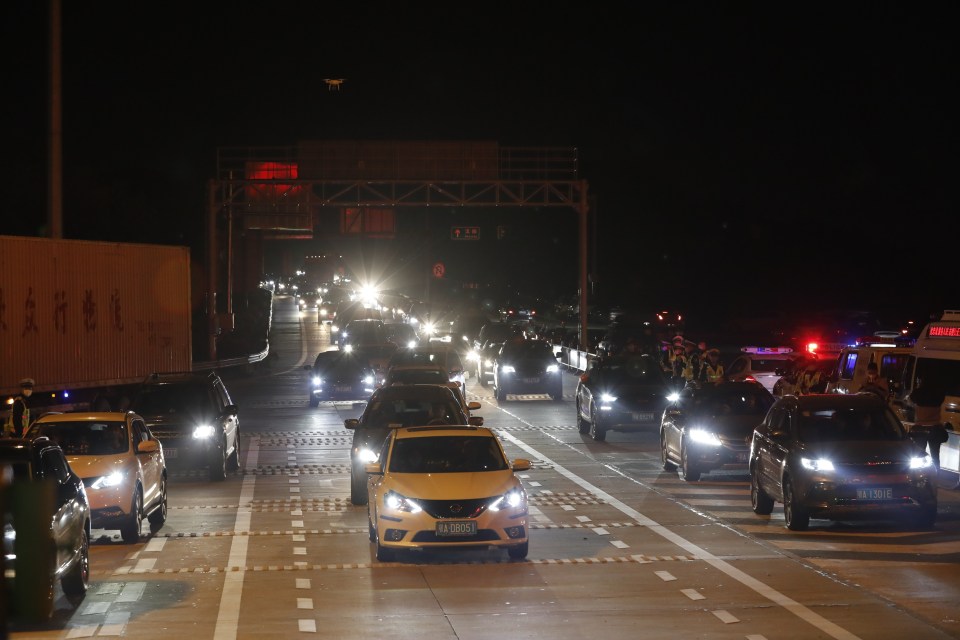  Hundreds of cars wait for the city to be reopened