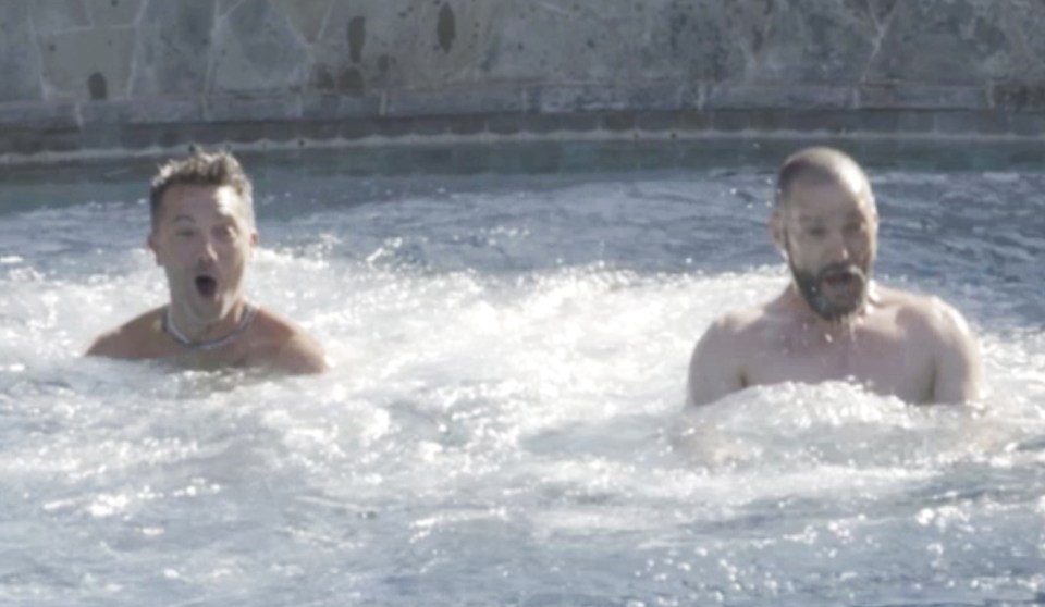 The pair strip off for a dip in the pool