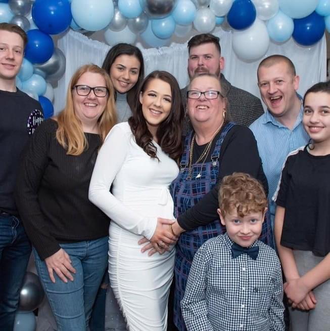  A happy family shot of Dean, provided by his sister Louisa - in glasses and wearing a black top. He is at the back and his mum is wearing blue and glasses