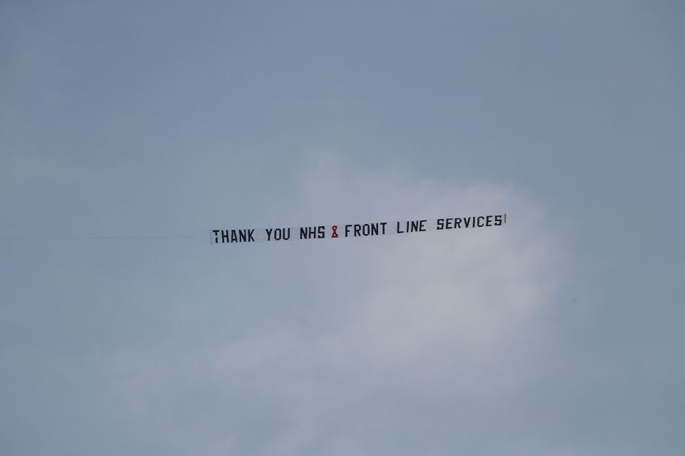  A plane flies over Liverpool pulling a sign to thank NHS workers