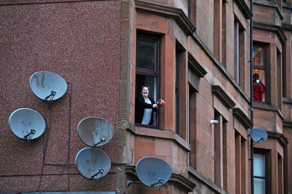  People applaud from their flats in Glasgow