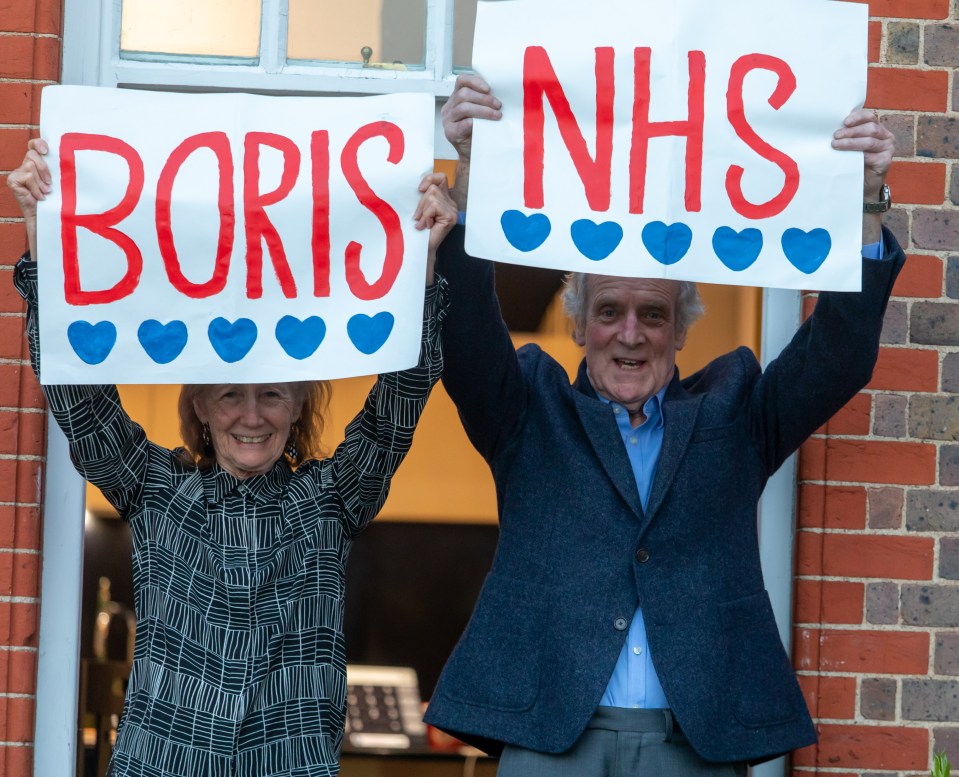  Recovering cancer patient Paul Morgan, 76, and his wife Carolyn, 84, from Wandsworth, show their appreciation for the Prime Minister and the NHS tonight