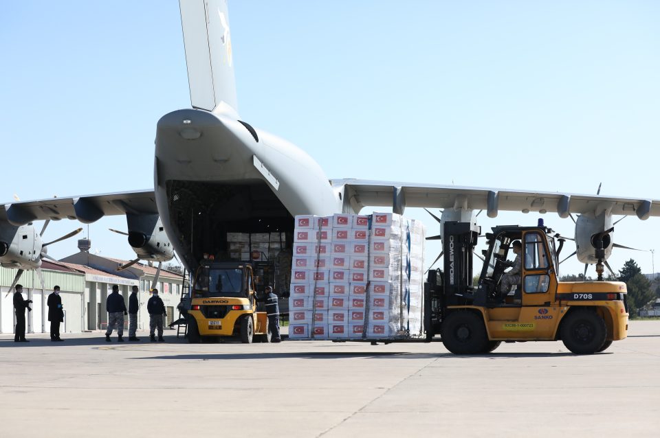 The cargo planes are carrying surgical masks, industrial masks and hazmat suits