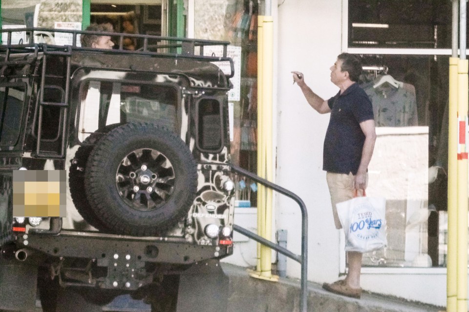  Gordon Ramsay seen behind his Land Rover Defender getting in a row with a shopper