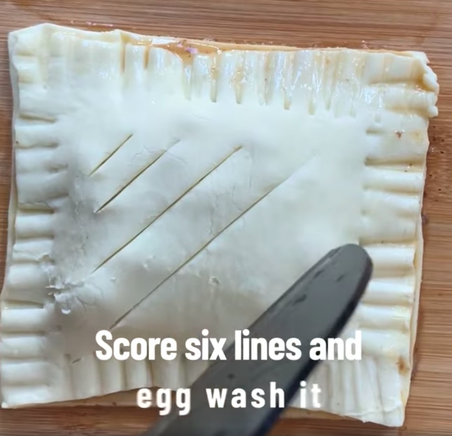 Add egg wash to the top of the bake so it'll go brown