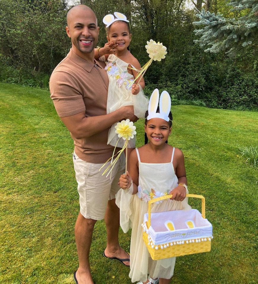  Rochelle shared this cute picture of husband Marvin with their two daughters dressed up