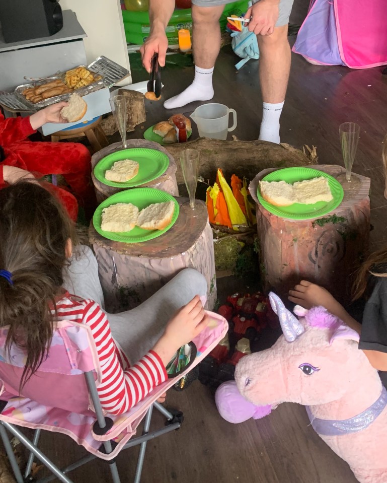  KayliMia, six, spent the weekend 'camping' in tents and sitting on logs around a makeshift campfire with her step brother and sister