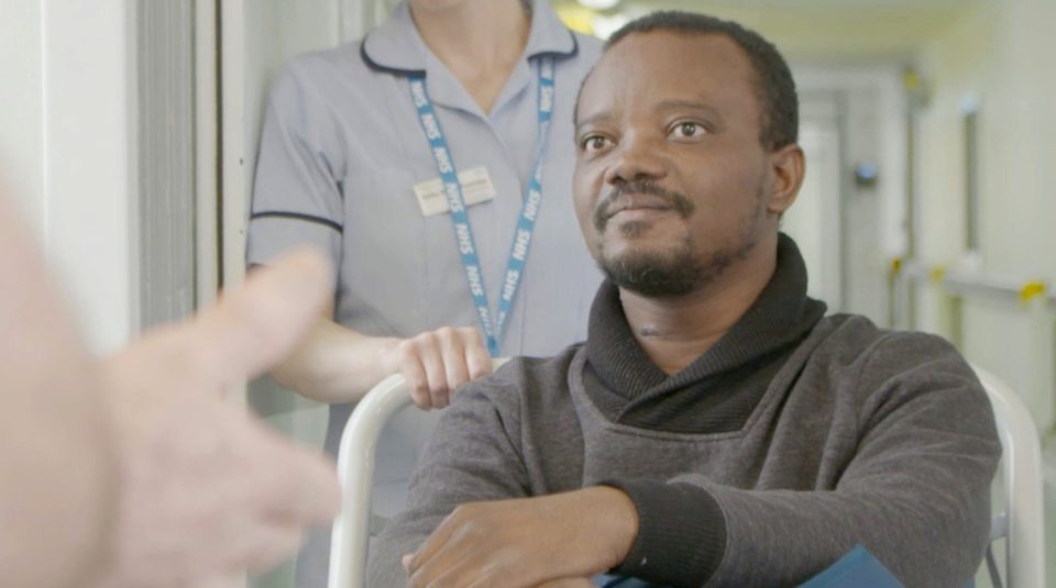 Patient George was wheeled out of a ward with a full guard of honour of nurses and doctors cheering his recovery