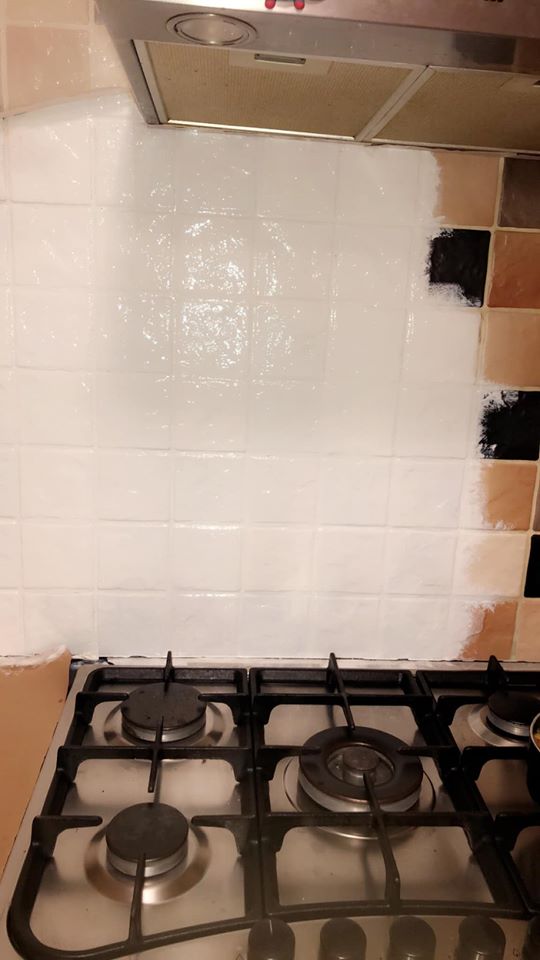 Rather than replacing tiles she just painted over the top, giving her a fresh new look for a fraction of the price