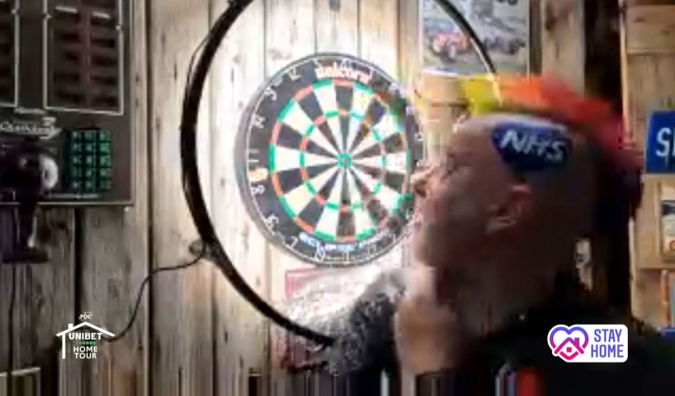 Peter Wright featured a fantastic NHS tribute as he won the first Home Tour match 5-4