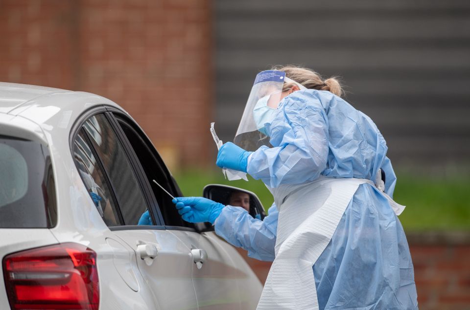  NHS staff carry out coronavirus tests at a facility in Bracebridge Heath, Lincoln