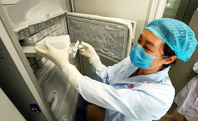 This image shows a loose seal on the door next to the lab worker’s head