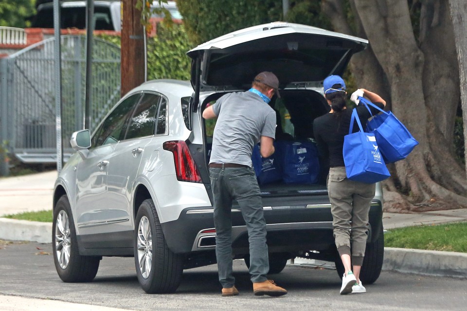  The pair were seen distributing supplies from a blacked-out 4x4