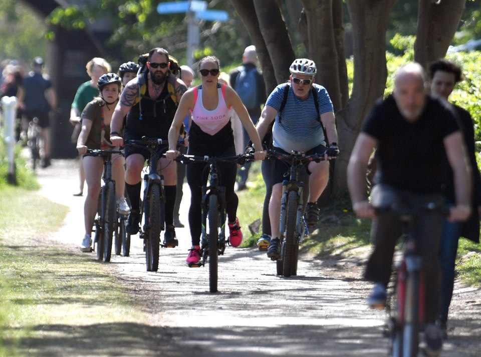  Cyclists struggled to stay spaced out during their daily exercise in Sale, Greater Manchester