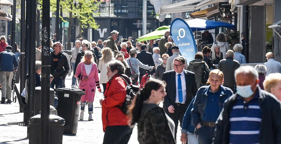 Packed streets in Germany as smaller stores in Gelsenkirchen, Germany open for the first time in a month