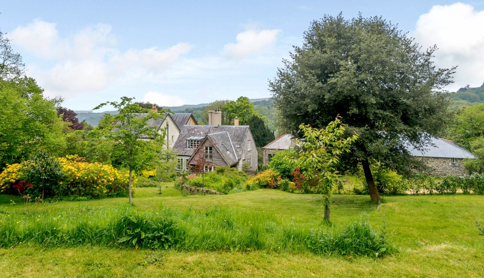  The property is in the village of Lustleigh, Devon