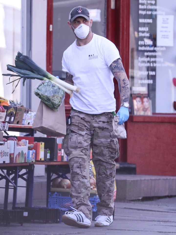  A masked Tom Hardy was spotted out in London buying some leeks