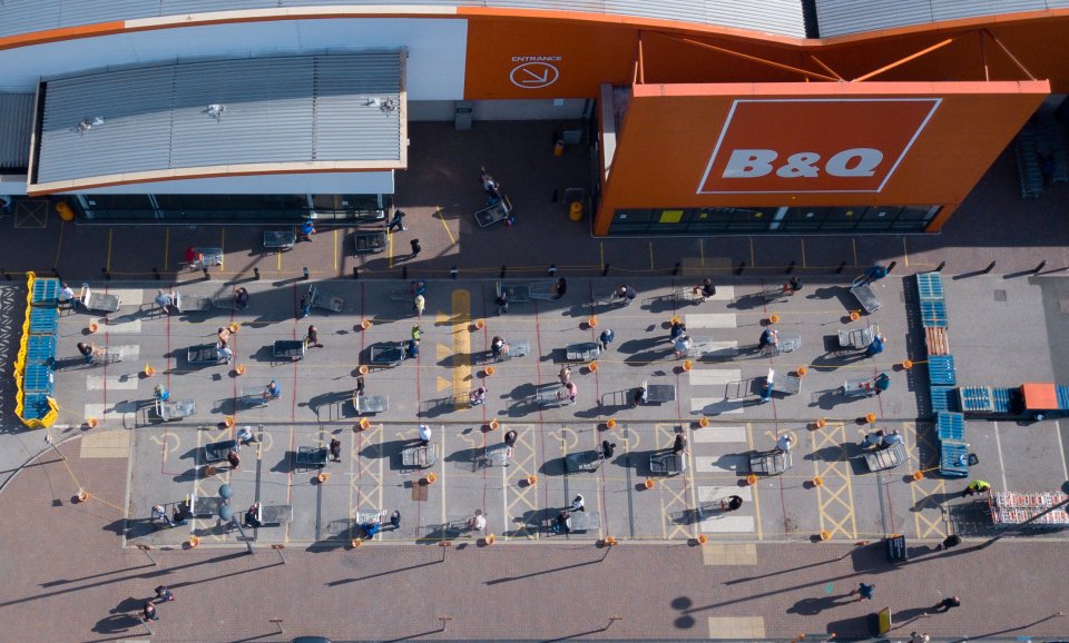  Shoppers queued in Ashfield, Notts, according to social-distancing restrictions