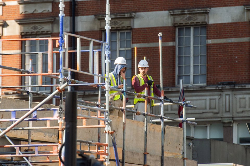  Builders working in Knightsbridge, London, this morning