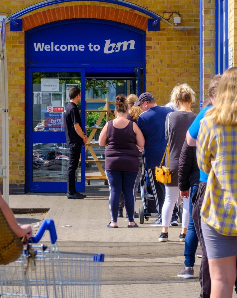  Shoppers were seen queuing outside the B&M store in Chelmsford, Essex, this morning