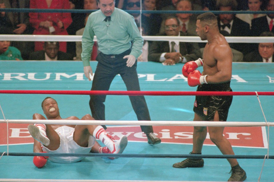  Mike Tyson would seek revenge on Holmes eight years later