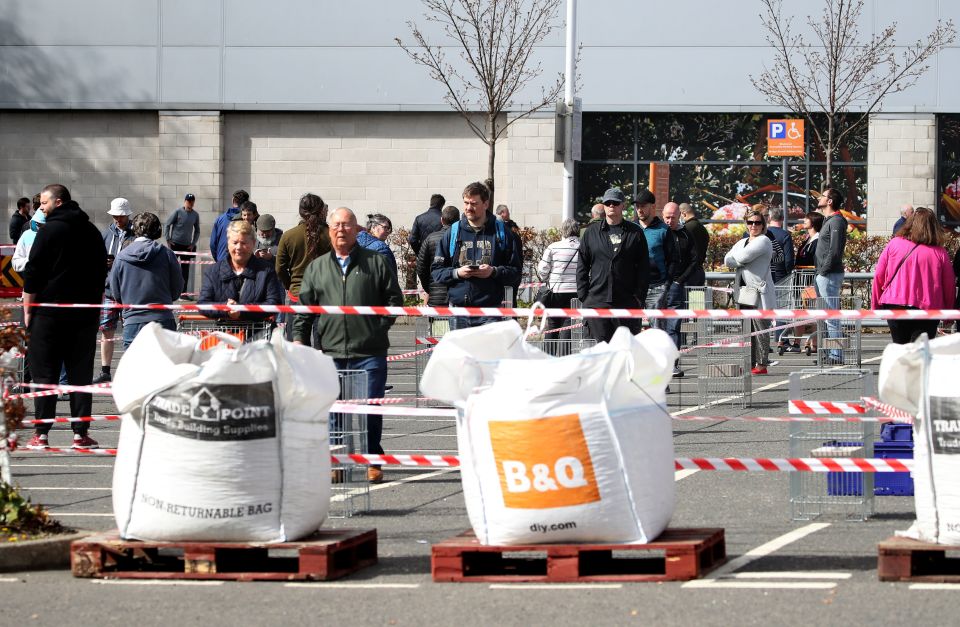  Shoppers queue at the hardware store in Edinburgh today