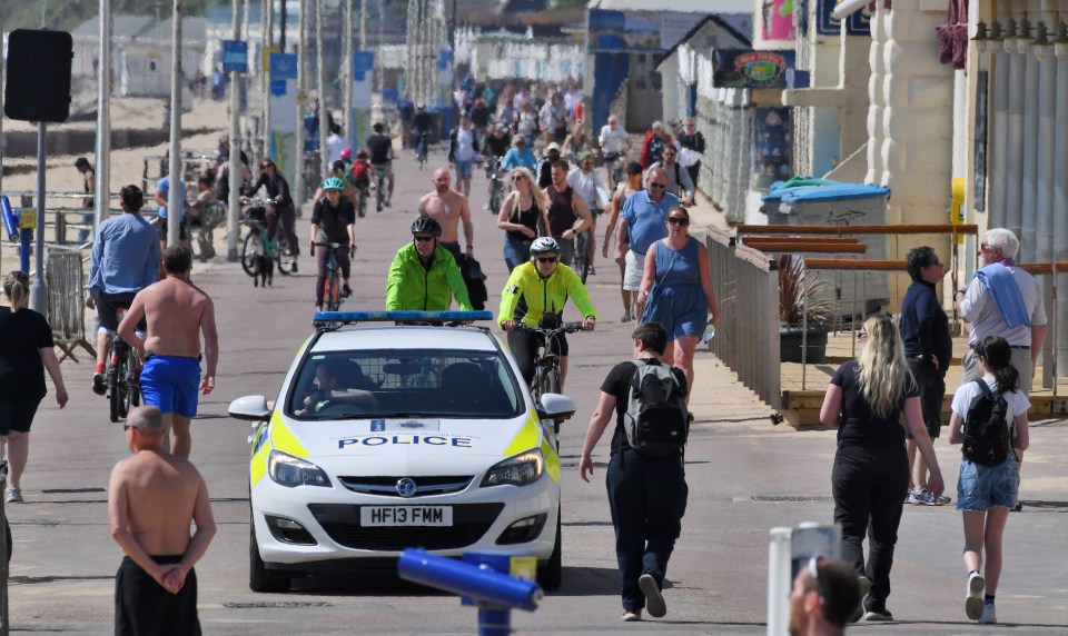  A police car on patrol in Bournemouth today as Brits flocked to the beach