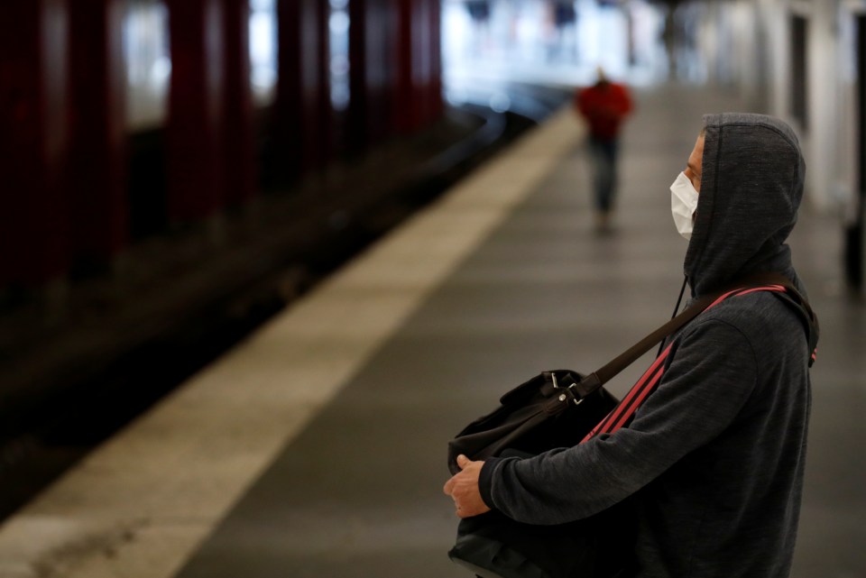  A man stands in Paris' eerily empty Gare du Nord train station