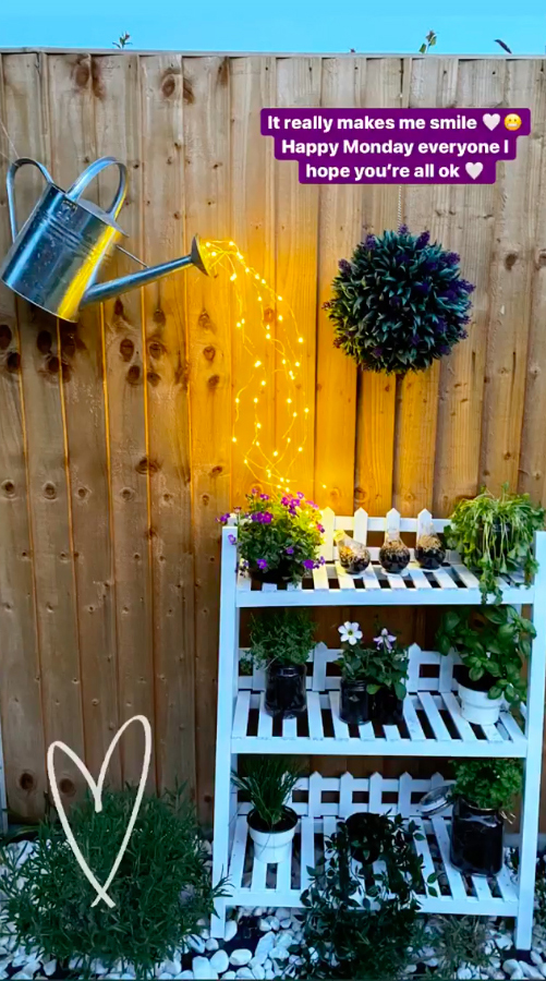 Stacey turned an old watering can and fairy lights into a pretty garden light display