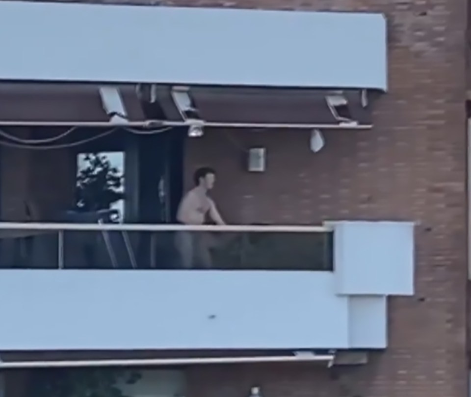  Footage shows the moment a couple were caught having sex on their balcony during a coronavirus lockdown