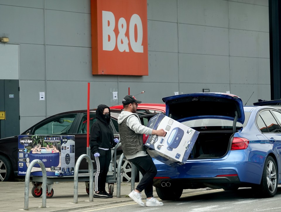 People shopping at B&Q in Beckton, East London, yesterday during the coronavirus crisis