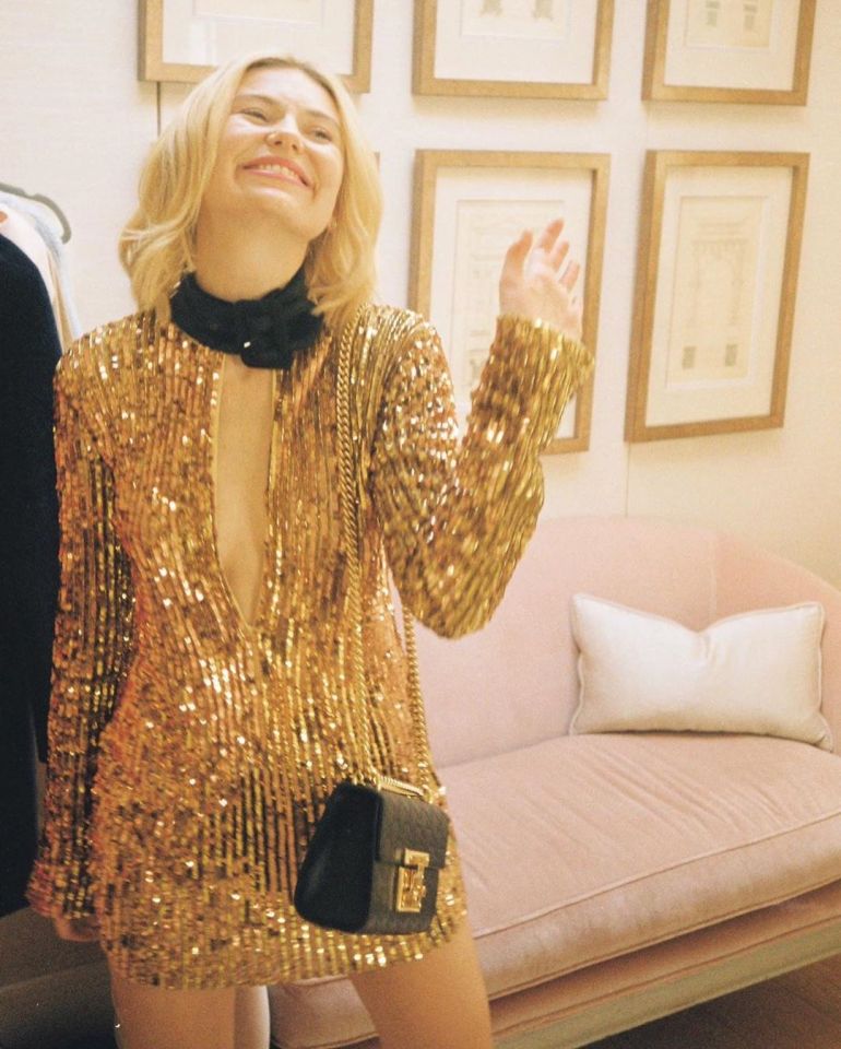 Georgia Toffolo was all dressed up with nowhere to go in this £1,505 gold sequin dress by Attico