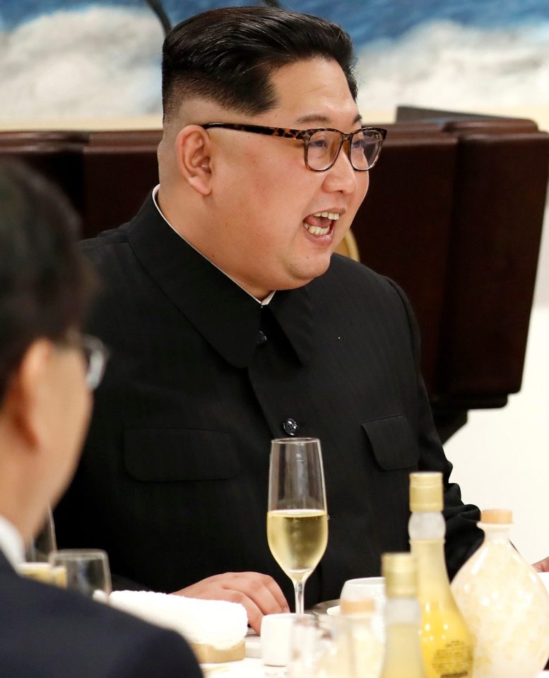  Kim Jong-un enjoys a drink during a meeting with South Korean president Moon Jae-in