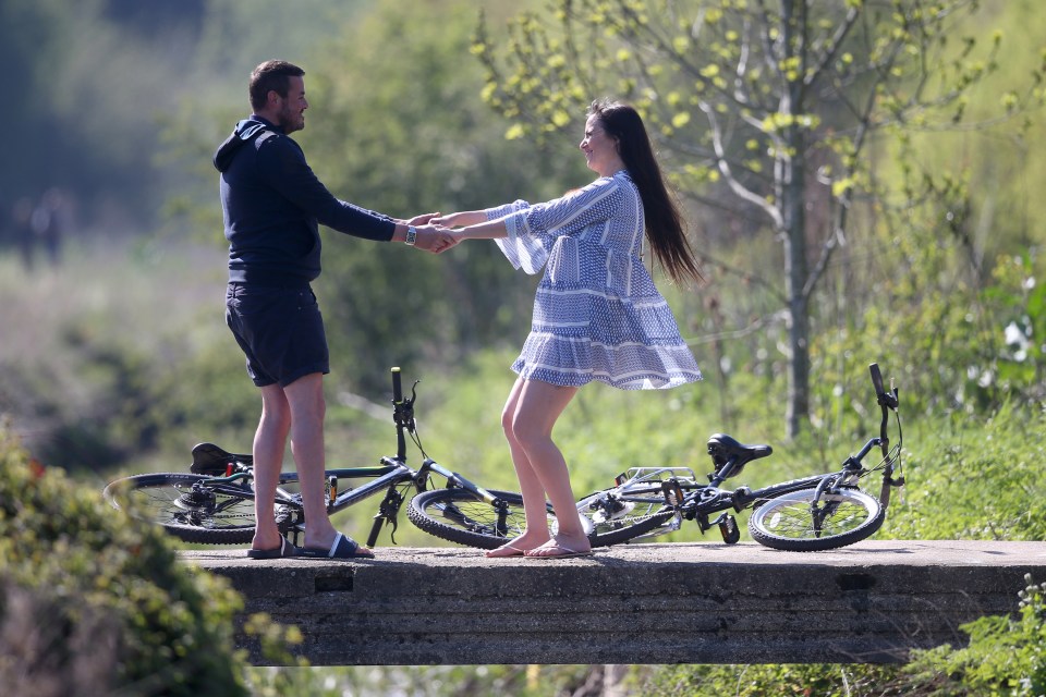  They couldn't keep their hands off each other on the bike ride