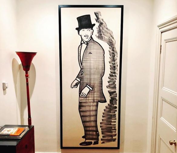  The journalist has displayed pieces of art he’s picked up along the way - including this one of Fred Astaire