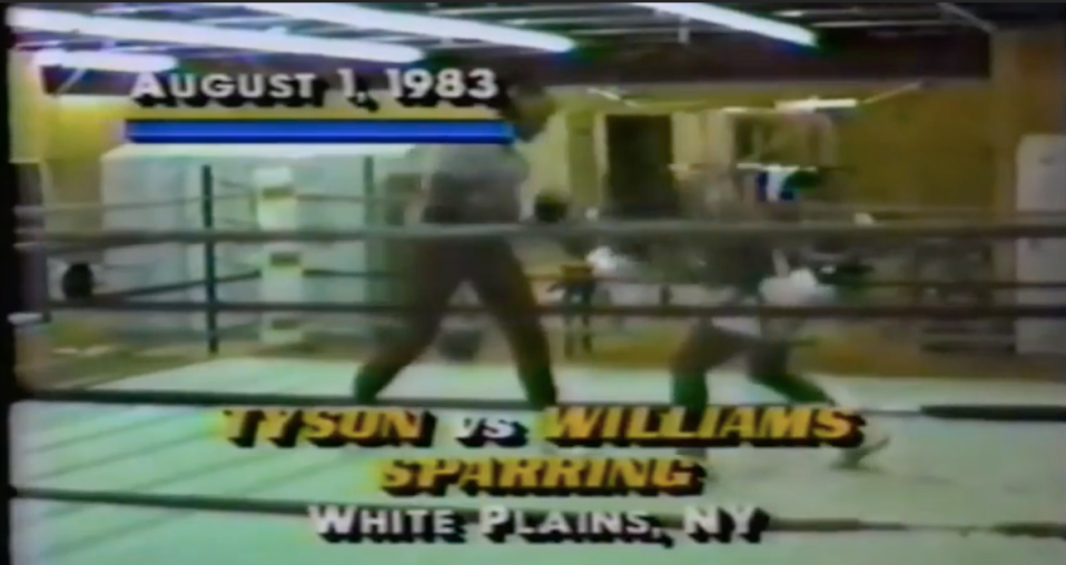  Tyson, right, spars Carl Williams as a teenager six years before beating him as a pro