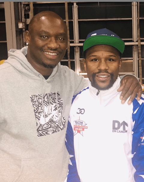  Tarver poses with his 1996 Olympic team-mate Floyd Mayweather